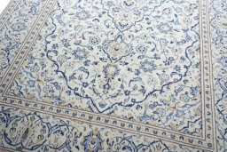 Close-up detail of 2000s Kashan rug from Iran / Persia showing Wool weave