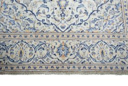 Full view of 2000s Kashan rug from Iran / Persia, 301 × 195 cm in Beige tones