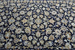 Central medallion detail of 2000s Kashan rug from Iran / Persia