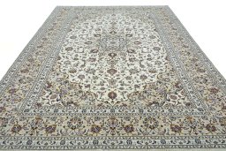 Surface texture of 2000s Kashan rug with natural Wool and intricate pattern
