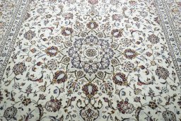 Central medallion detail of 2000s Kashan rug from Iran / Persia