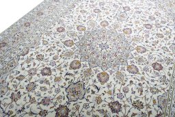 Backside of handmade 2000s Kashan rug showing knot structure and weave density