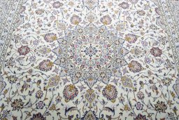 Central medallion detail of 2000s Kashan rug from Iran / Persia