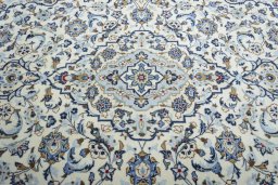Central medallion detail of 2000s Kashan rug from Iran / Persia