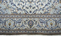 Full view of 2000s Kashan rug from Iran / Persia, 293 × 198 cm in Beige tones
