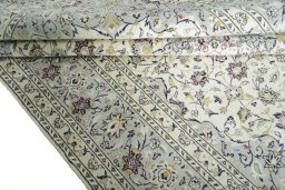 Close-up detail of New Kashan rug from Iran / Persia showing Wool weave