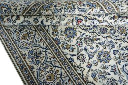 Close-up detail of 2000s Kashan rug from Iran / Persia showing Wool weave