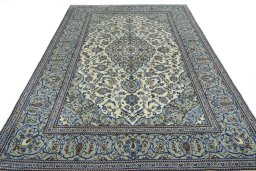 Surface texture of 2000s Kashan rug with natural Wool and intricate pattern