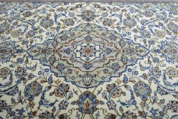 Central medallion detail of 2000s Kashan rug from Iran / Persia