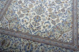 Close-up detail of 2000s Kashan rug from Iran / Persia showing Wool weave
