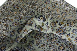 Surface texture of 2000s Kashan rug with natural Wool and intricate pattern