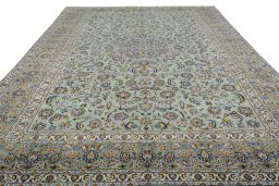 Surface texture of 2000s Kashan rug with natural Wool and intricate pattern