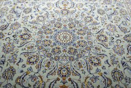 Central medallion detail of 2000s Kashan rug from Iran / Persia