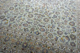 Close-up detail of 2000s Kashan rug from Iran / Persia showing Wool weave