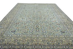 Surface texture of 2000s Kashan rug with natural Wool and intricate pattern