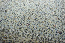 Close-up detail of 2000s Kashan rug from Iran / Persia showing Wool weave