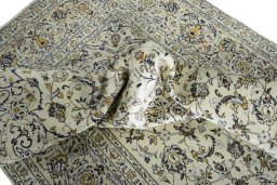 Surface texture of 2000s Kashan rug with natural Wool and intricate pattern