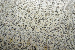 Close-up detail of 2000s Kashan rug from Iran / Persia showing Wool weave