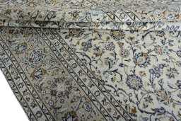 Close-up detail of 2000s Kashan rug from Iran / Persia showing Wool weave