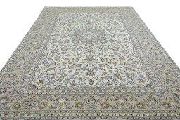 Surface texture of 2000s Kashan rug with natural Wool and intricate pattern