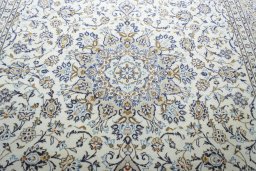 Central medallion detail of 2000s Kashan rug from Iran / Persia