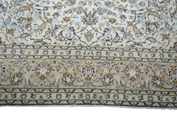 Full view of 2000s Kashan rug from Iran / Persia, 337 × 235 cm in Beige tones