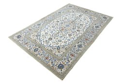 Corner detail of 2000s Kashan rug showing border pattern and Wool pile