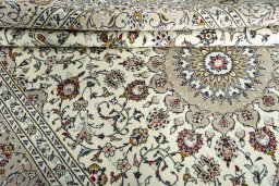 Close-up detail of New Kashan rug from Iran / Persia showing Wool weave