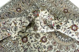 Surface texture of New Kashan rug with natural Wool and intricate pattern
