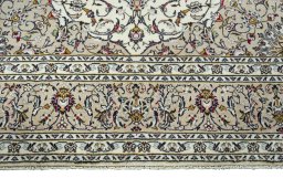 Full view of New Kashan rug from Iran / Persia, 361 × 243 cm in Beige tones