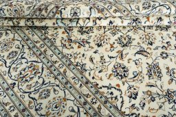 Close-up detail of 2000s Kashan rug from Iran / Persia showing Wool weave