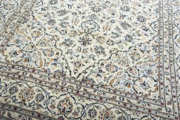 Close-up detail of 2000s Kashan rug from Iran / Persia showing Wool weave
