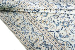 Close-up detail of New Kashan rug from Iran / Persia showing Wool weave
