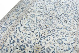 Backside of handmade New Kashan rug showing knot structure and weave density