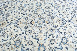 Central medallion detail of New Kashan rug from Iran / Persia