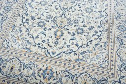 Close-up detail of New Kashan rug from Iran / Persia showing Wool weave