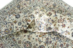 Surface texture of New Kashan rug with natural Wool and intricate pattern