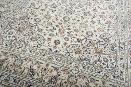 Close-up detail of New Kashan rug from Iran / Persia showing Wool weave