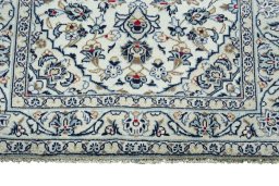 Central medallion detail of 2000s Kashan rug from Iran / Persia