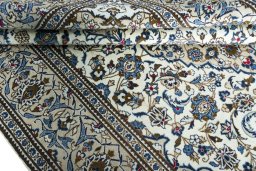 Close-up detail of 2000s Kashan rug from Iran / Persia showing Wool weave
