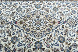 Central medallion detail of 2000s Kashan rug from Iran / Persia