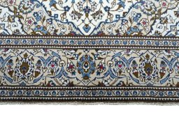 Full view of 2000s Kashan rug from Iran / Persia, 301 × 196 cm in Beige tones