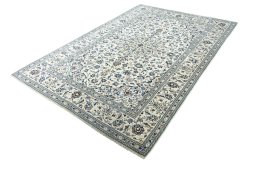 Corner detail of New Kashan rug showing border pattern and Wool pile
