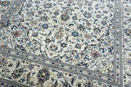 Close-up detail of New Kashan rug from Iran / Persia showing Wool weave