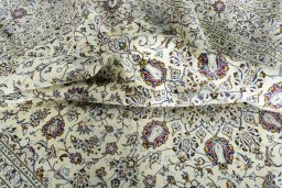 Surface texture of 2000s Kashan rug with natural Wool and intricate pattern