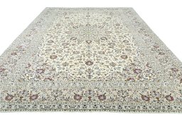 Surface texture of 2000s Kashan rug with natural Wool and intricate pattern