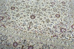 Close-up detail of 2000s Kashan rug from Iran / Persia showing Wool weave
