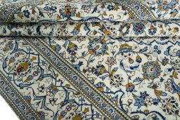 Close-up detail of 2000s Kashan rug from Iran / Persia showing Wool weave