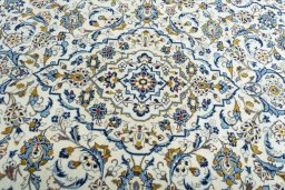 Central medallion detail of 2000s Kashan rug from Iran / Persia