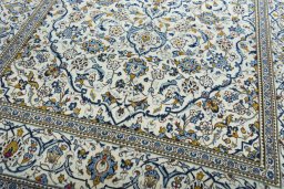 Close-up detail of 2000s Kashan rug from Iran / Persia showing Wool weave